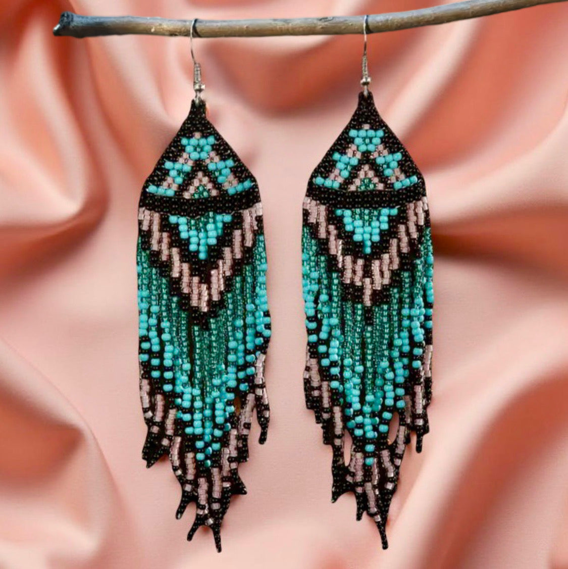 Handmade beaded earrings featuring turquoise and pink long tassel fringe, with hypoallergenic medical-grade 316L surgical steel lever backs.