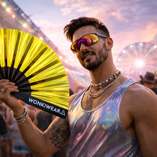 Festival model holding gold iridescent rave fan by WonkiWear, XL reflective hand fan in use