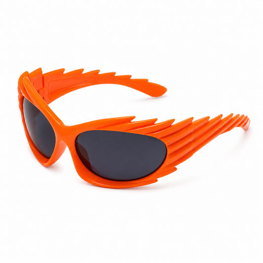 Neon orange futuristic spikey ridged festival sunglasses on white background