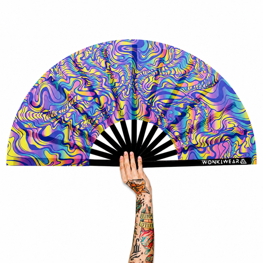 XL UV reactive psychedelic festival fan with black bamboo ribs on white background