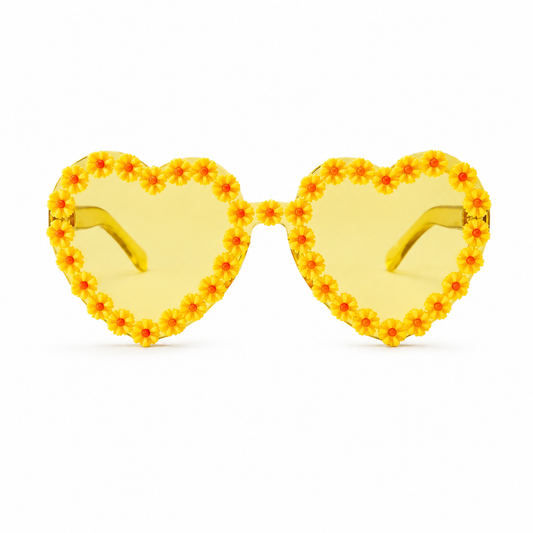 Yellow heart shaped daisy festival glasses on white background