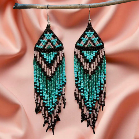 Handmade beaded earrings featuring turquoise and pink long tassel fringe, with hypoallergenic medical-grade 316L surgical steel lever backs.