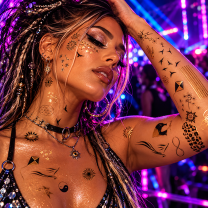 Person wearing gold and black metallic temporary tattoos at a neon-lit rave