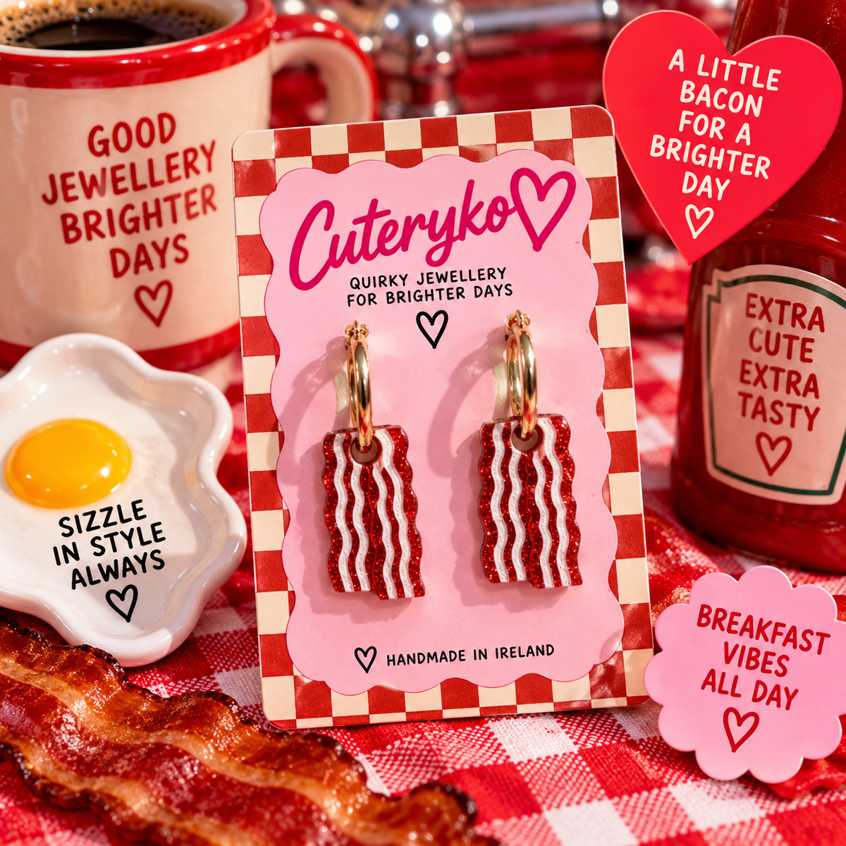 Cuteryko bacon hoop earrings with glittery red and white bacon strip charms on gold hoops