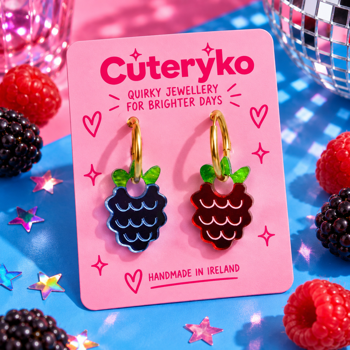 Asymmetrical Berry Hoop Earrings with blue and red berry charms by Cuteryko