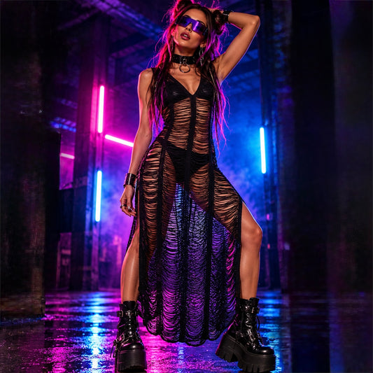 Black distressed mesh rave dress layered over black and neon clubwear at an underground techno rave