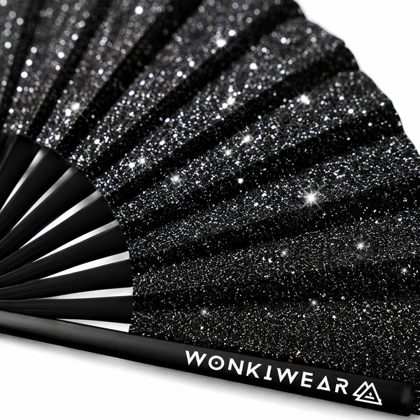 Close up glitter detail of black festival folding fan