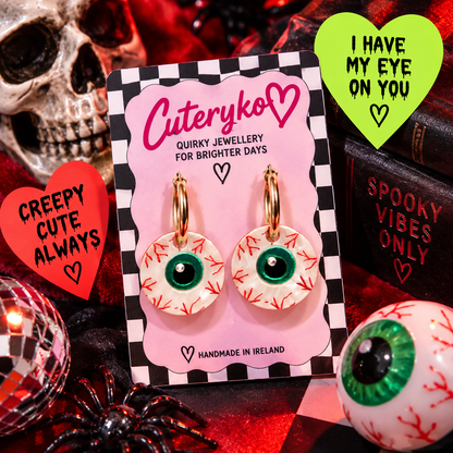 Bloodshot Eyeball hoop earrings with green irises and red veins by Cuteryko