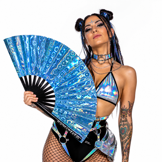 Festival model holding blue holographic XL rave fan