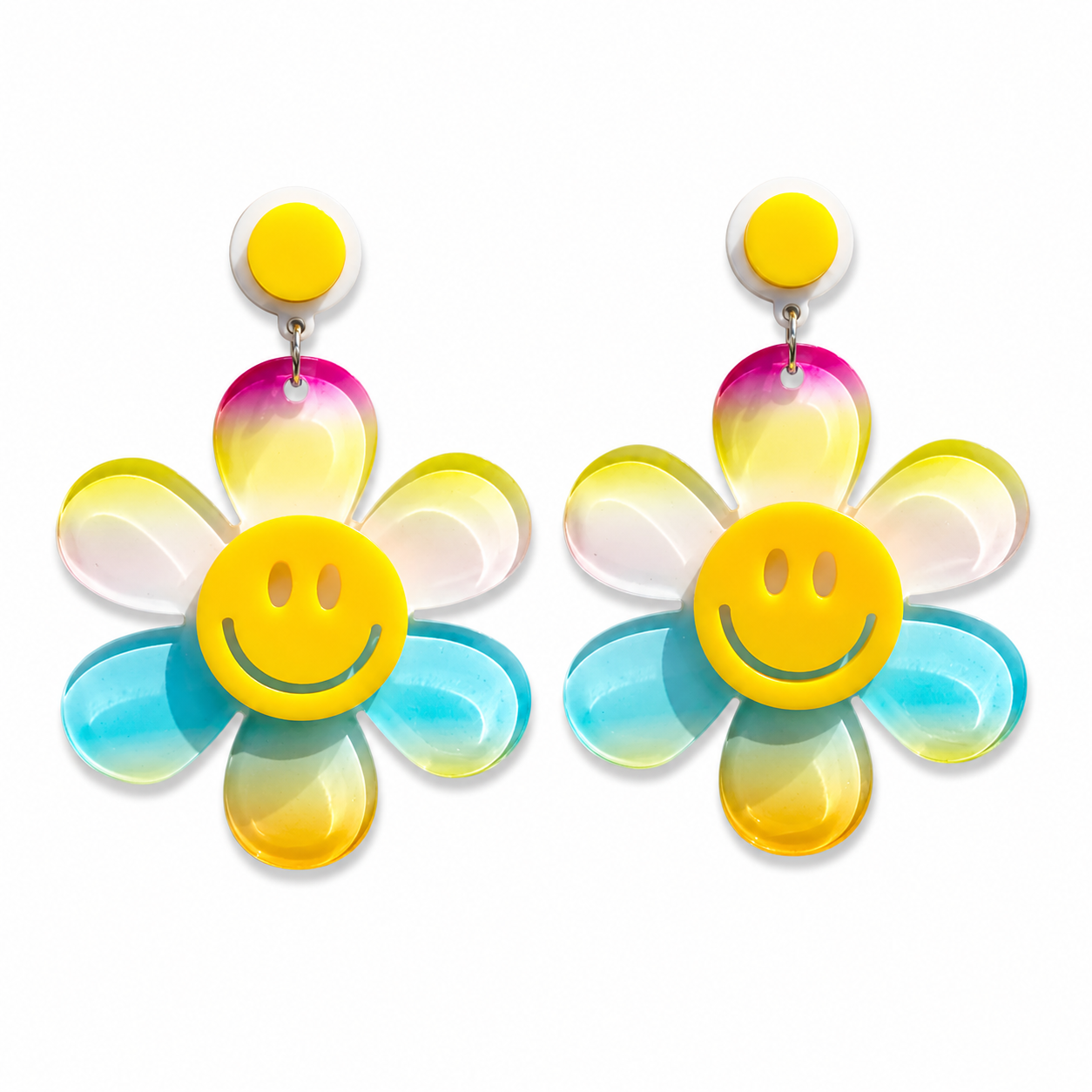 Oversized blue smiley daisy earrings on white background