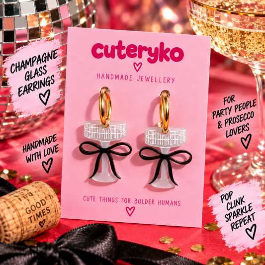 Champagne glass hoop earrings with black bow details by Cuteryko