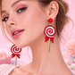 Model wearing lollipop earrings cute outfit UK