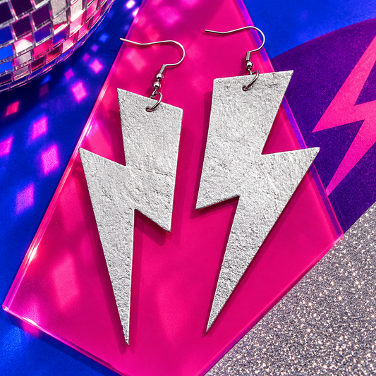 Extra large silver lightning bolt cork earrings with leopard print reverse by Trend Tonic