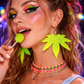 Model wearing neon green statement earrings festival outfit