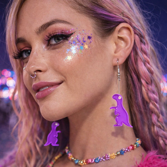 Model wearing purple dinosaur earrings festival rave outfit UK