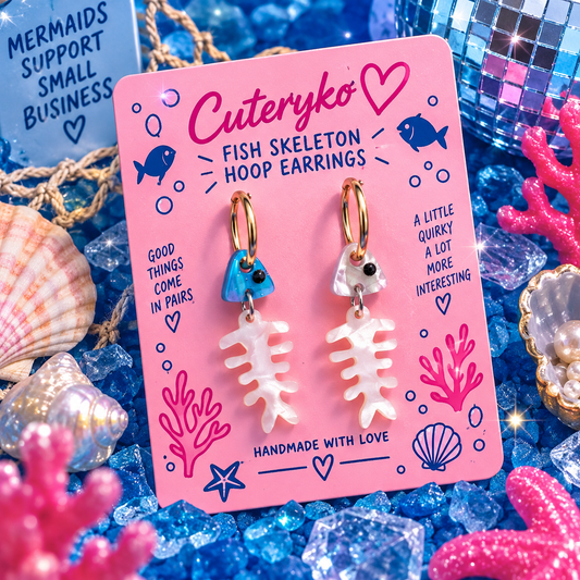 Fish Skeleton hoop earrings with mismatched blue and pearlescent fish charms by Cuteryko