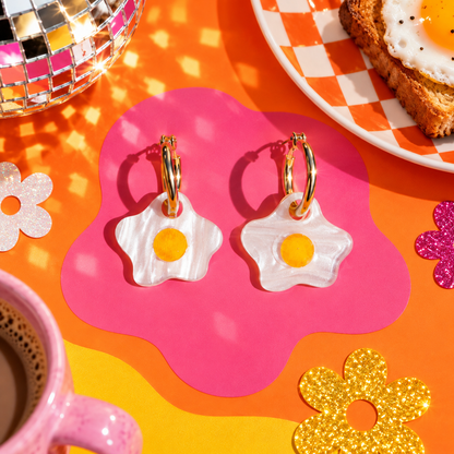 Fried Egg hoop earrings with pearlescent white egg charms and golden yolks by Cuteryko