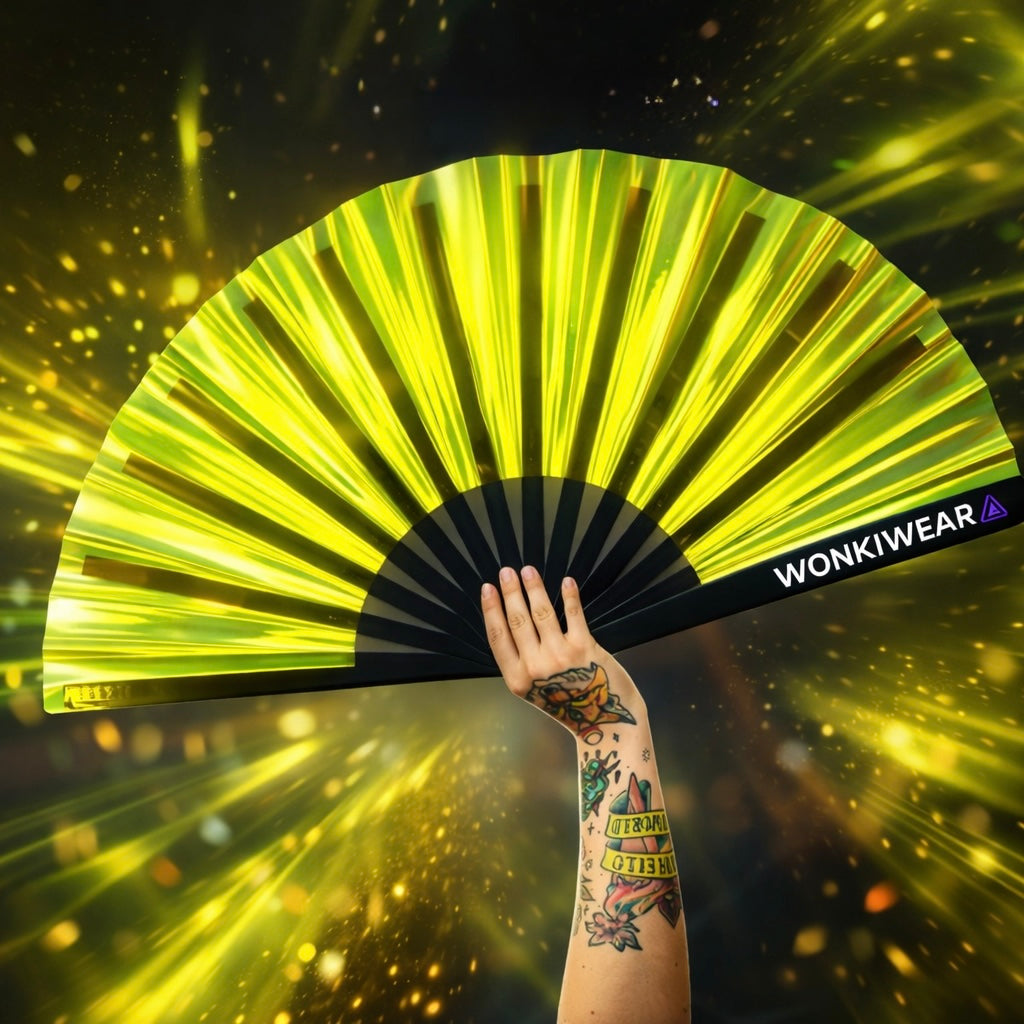 Gold iridescent festival fan reflecting light at rave, XL hand fan with holographic shine