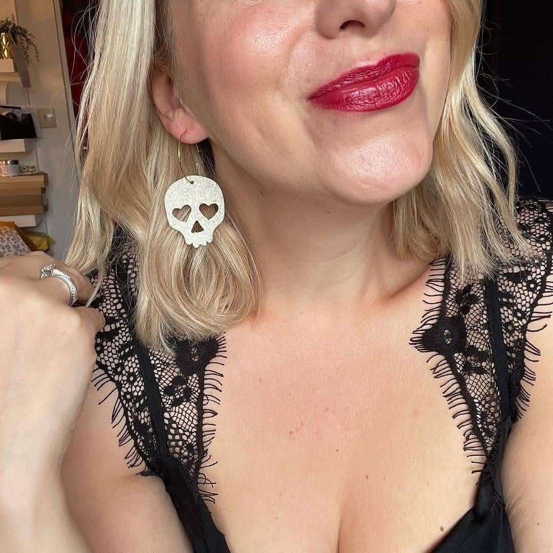 Trend Tonic gold or silver skull earrings additional product view.