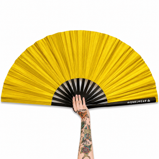 XL gold shimmer festival fan with metallic finish and black bamboo ribs