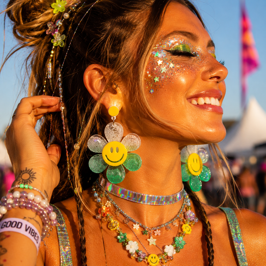 Festival model wearing oversized green glitter daisy statement earrings