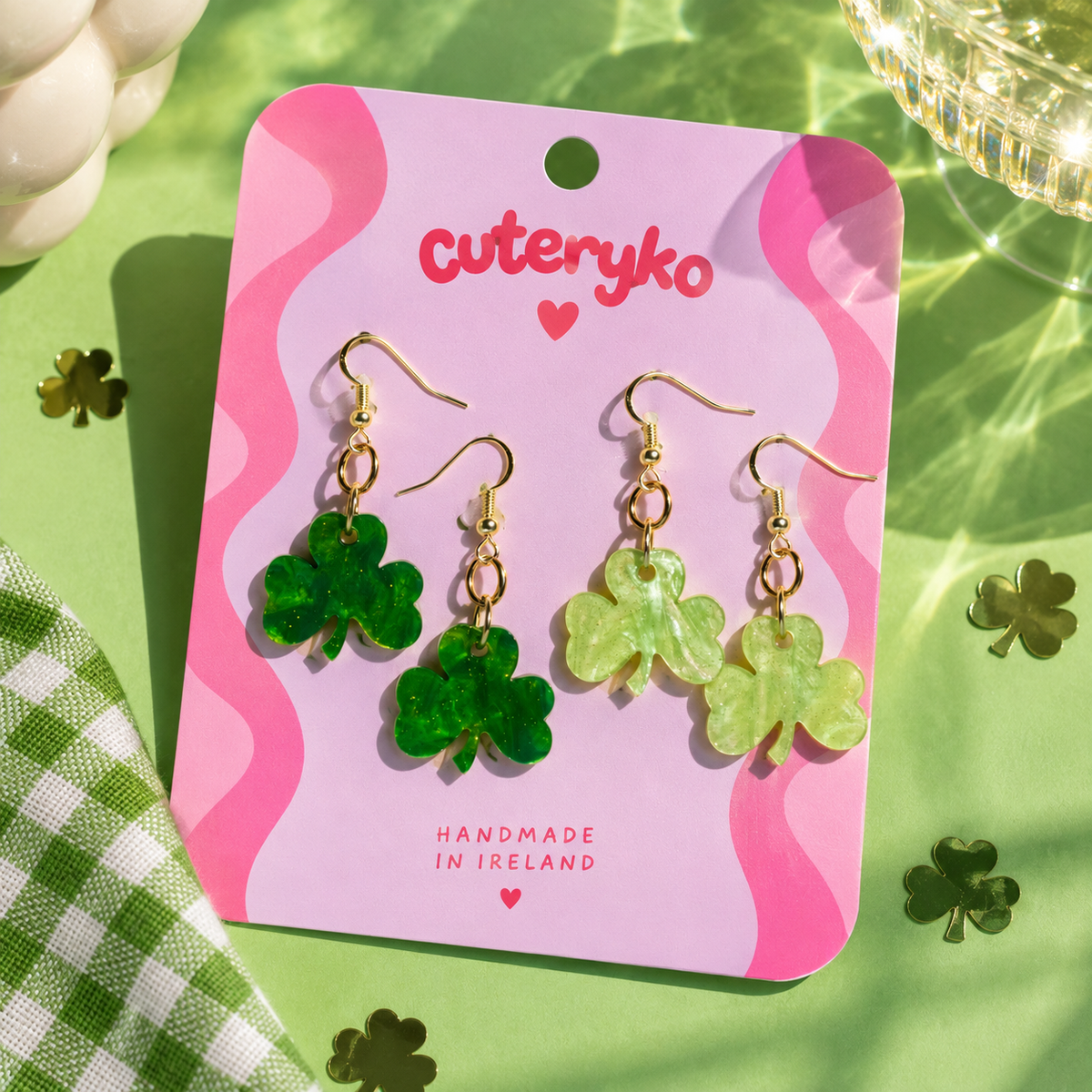 Handmade shamrock earrings in emerald green and light green by Cuteryko with sterling silver hooks