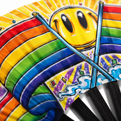 Close-up of colourful rainbow Pride artwork on silky festival fan