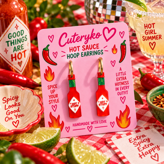 Hot Sauce hoop earrings with red “HOT STUFF” bottle charms and gold hoops by Cuteryko