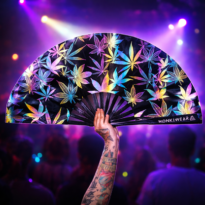 Wonkiwear reflective iridescent leaf rave fan glowing under festival and concert lights
