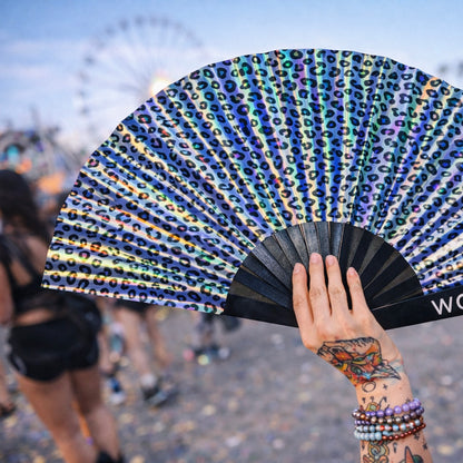 Iridescent leopard rave fan in festival crowd colorful reflective accessory WonkiWear
