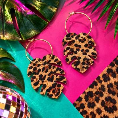 Leopard print monstera leaf earrings with gold stainless steel hoops