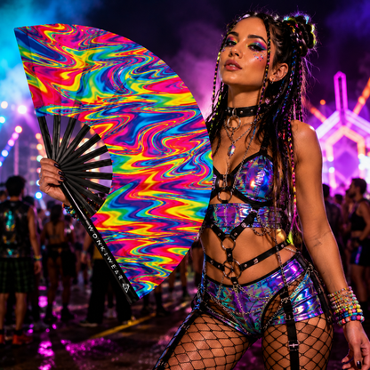 Festival goer using the WonkiWear Liquid Prism XL folding fan at a music festival.