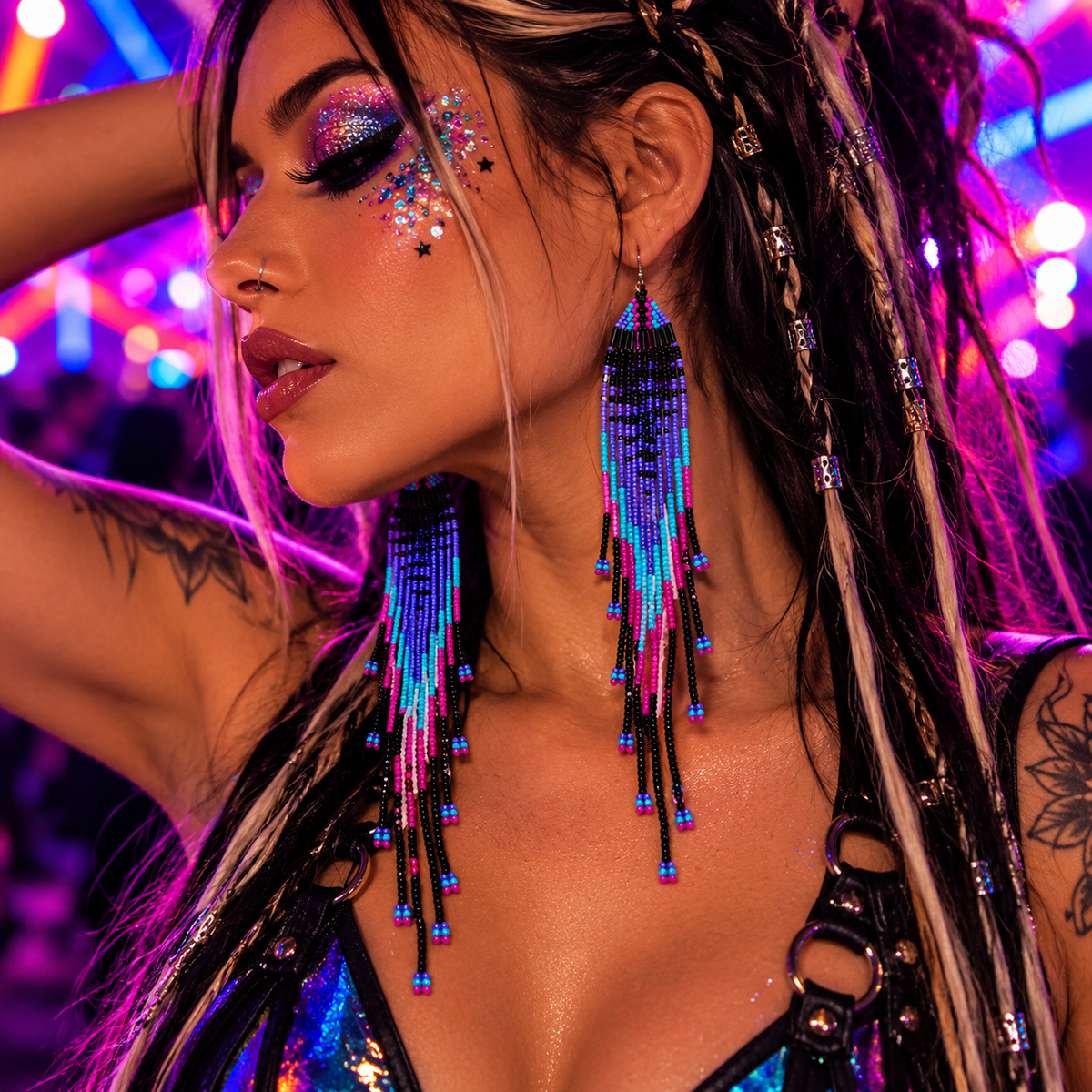 Woman wearing long colourful beaded jellyfish fringe earrings at a neon rave festival 