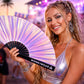 Woman holding Mermaid Wishes iridescent fan at festival wearing sparkly outfit