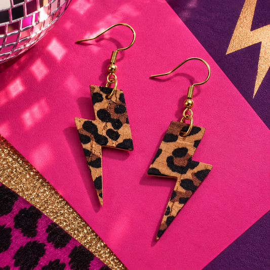 Mini leopard print lightning bolt cork earrings with gold hardware by Trend Tonic