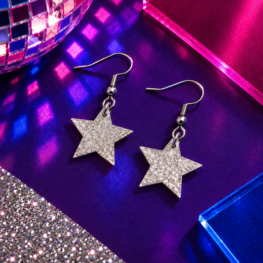 Mini silver glitter cork star earrings with stainless steel hooks by Trend Tonic