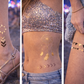 Minimal gold and black mantra temporary tattoos styled for clean festival aesthetic