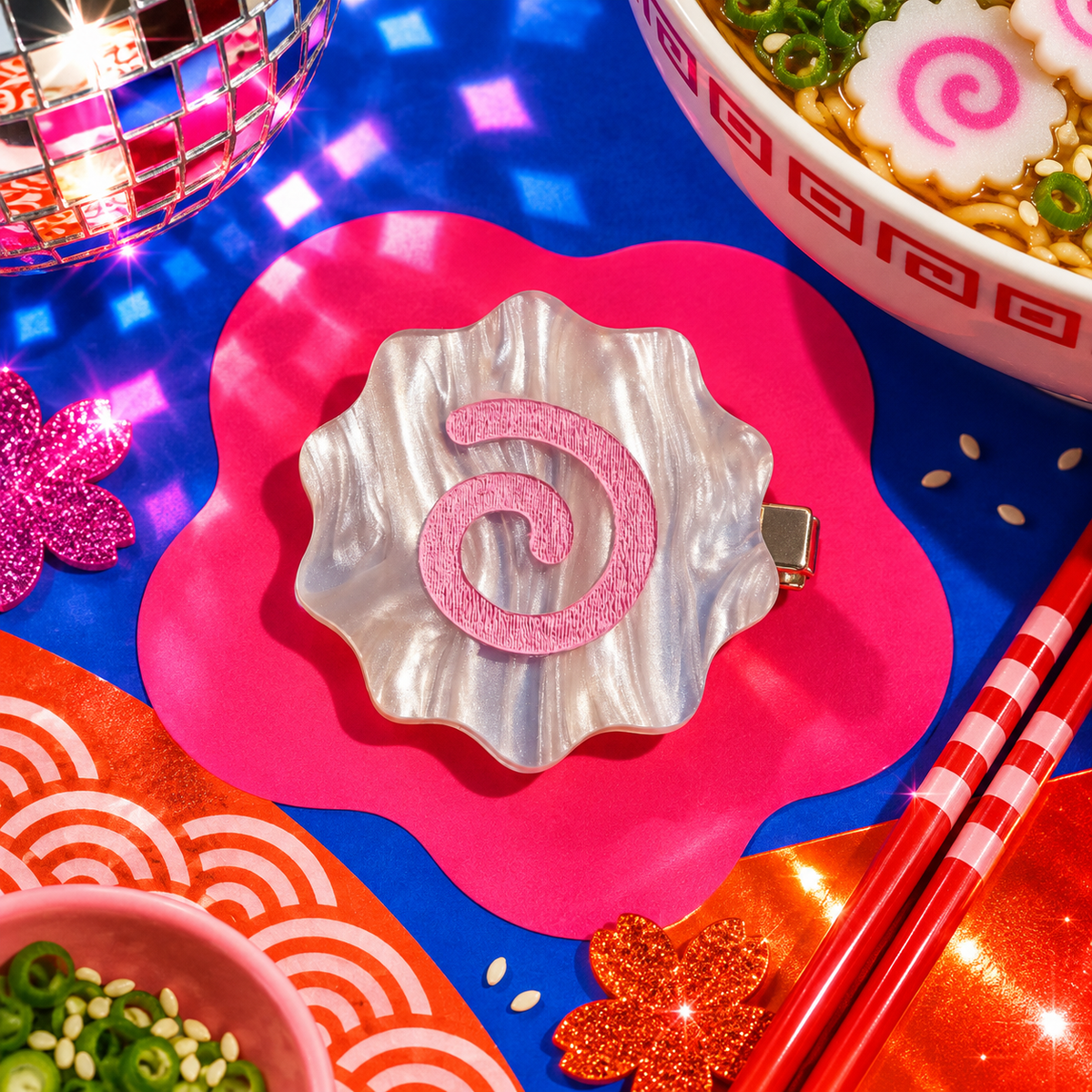 Narutomaki fish cake hair clip with pearlescent white acrylic and pink spiral detail by Cuteryko