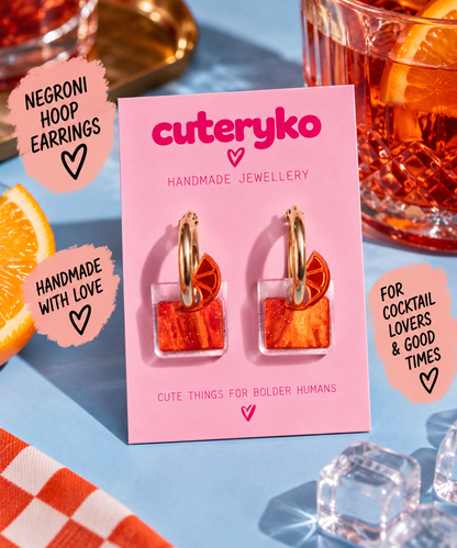 Negroni hoop earrings with orange cocktail charms and gold hoops by Cuteryko