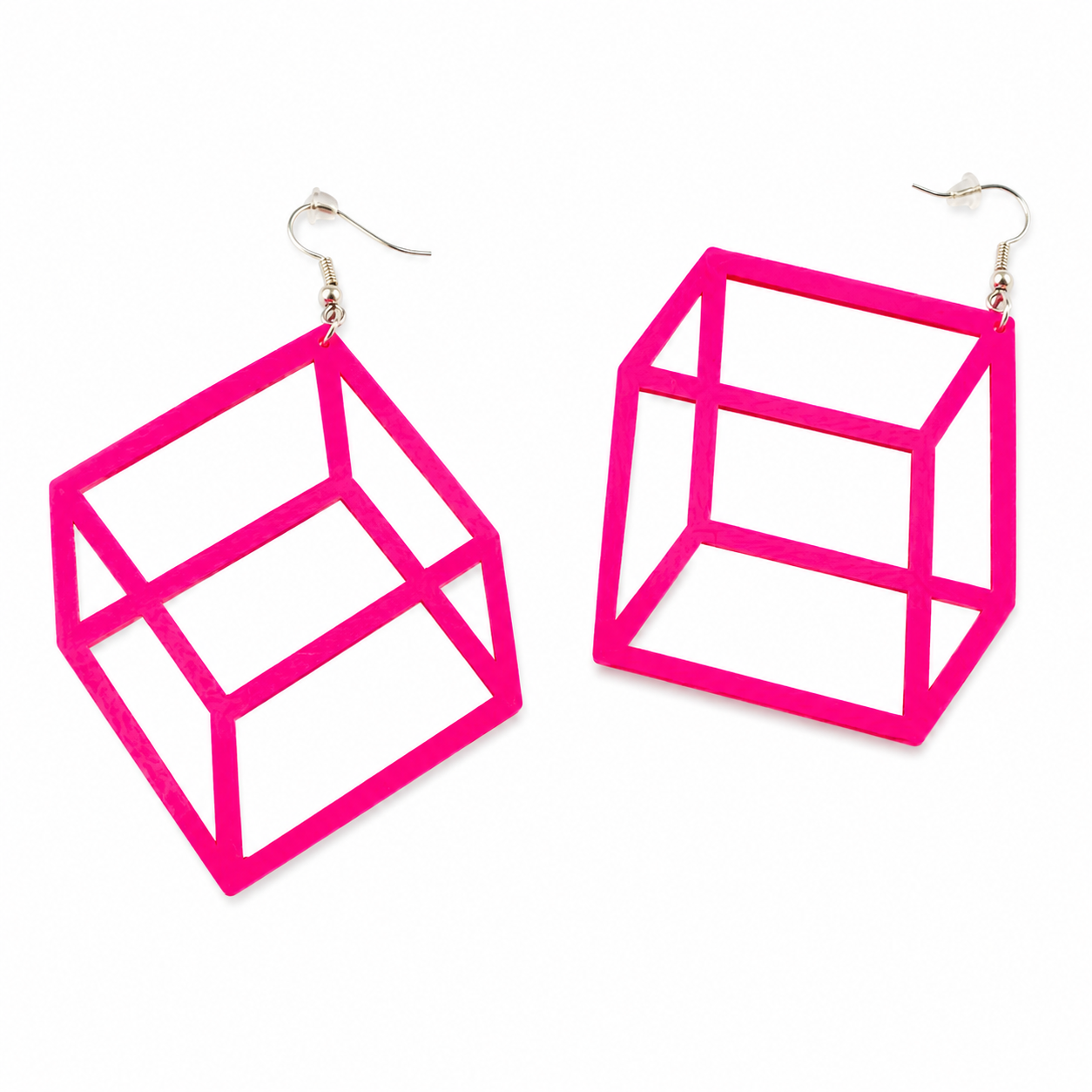 Neon pink geometric 3D illusion cube statement earrings on white background