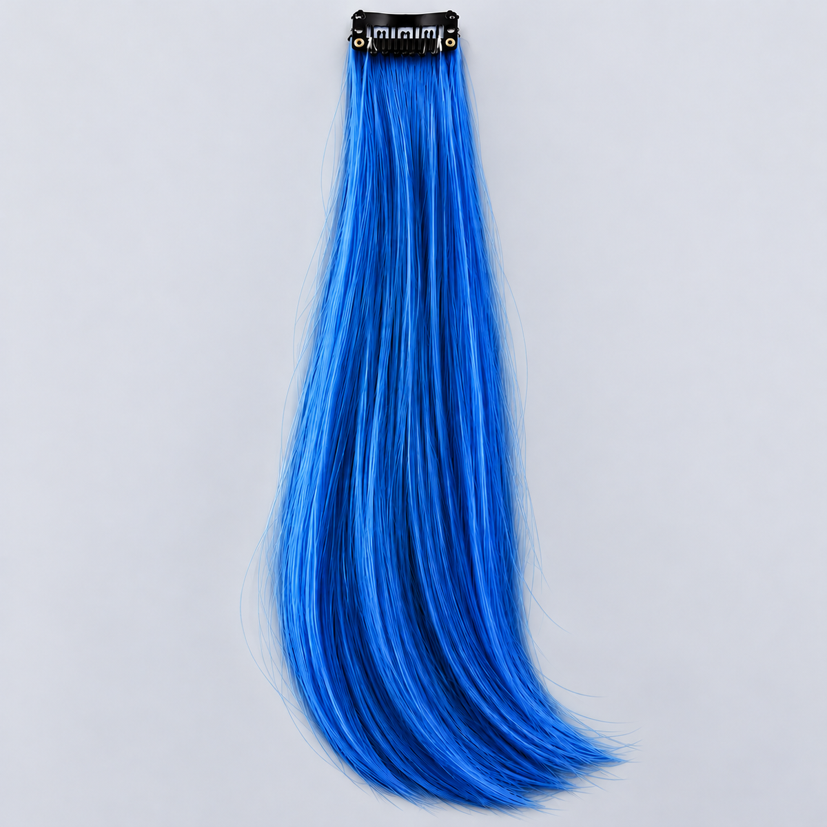 Dark blue clip-in hair extension with long, silky cobalt-blue strands and a black attachment clip.