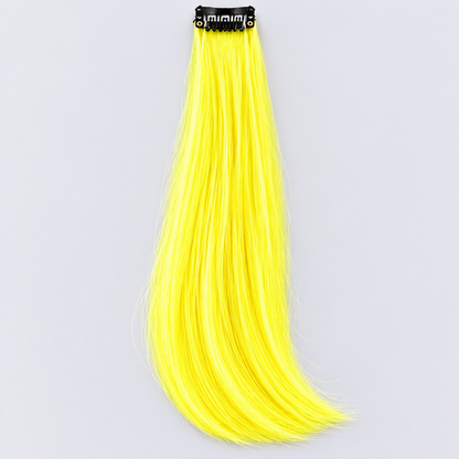 Yellow clip-in hair extension with long, silky neon-yellow strands and a black attachment clip.
