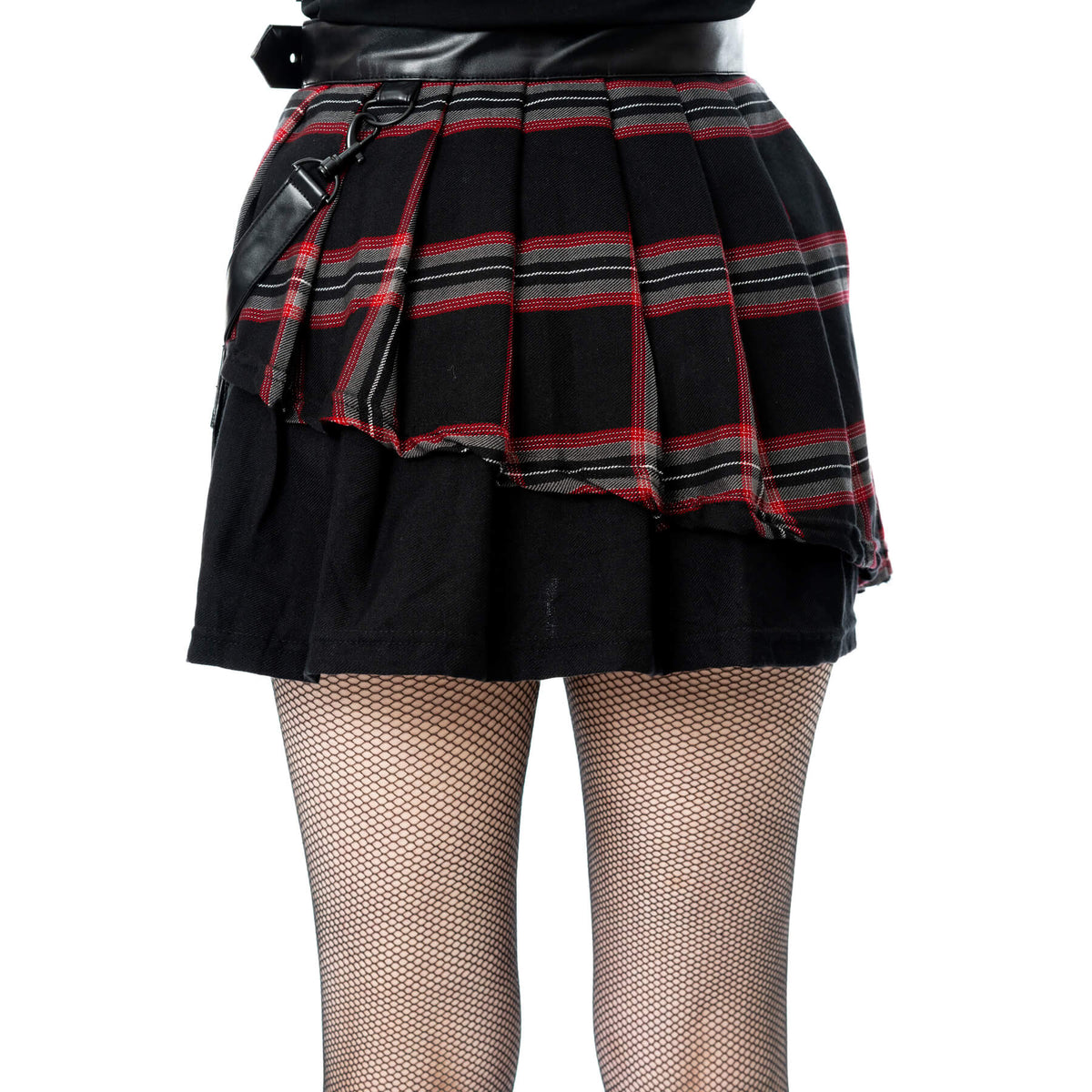 Close-up of the Poizen Industries Phantom Highlander skirt's black and red tartan pleats and layered panels.