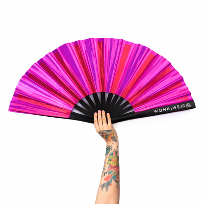 Pink iridescent festival fan XL rave fan UK with holographic finish and black ribs