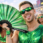 Man holding Pixie Dust green holographic rave fan at festival with reflective metallic finish