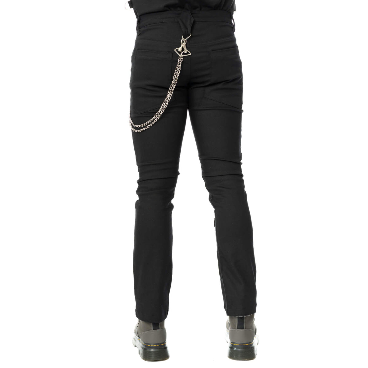 Back view of black Sanctified Sins trousers showing the fitted cut and decorative metal chain