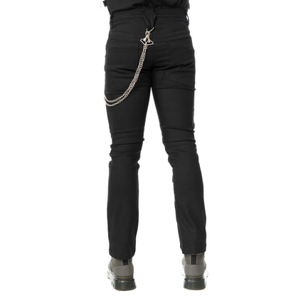 Back view of black Sanctified Sins trousers showing the fitted cut and decorative metal chain