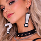 Model wearing question mark earrings alternative styling UK