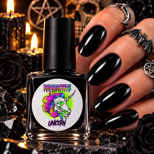 Radioactive Unicorn Pentaglam glossy black nail polish shown on shiny black nails with gothic styling