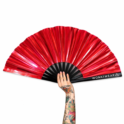 Red iridescent festival fan XL by WonkiWear with black ribs and handle